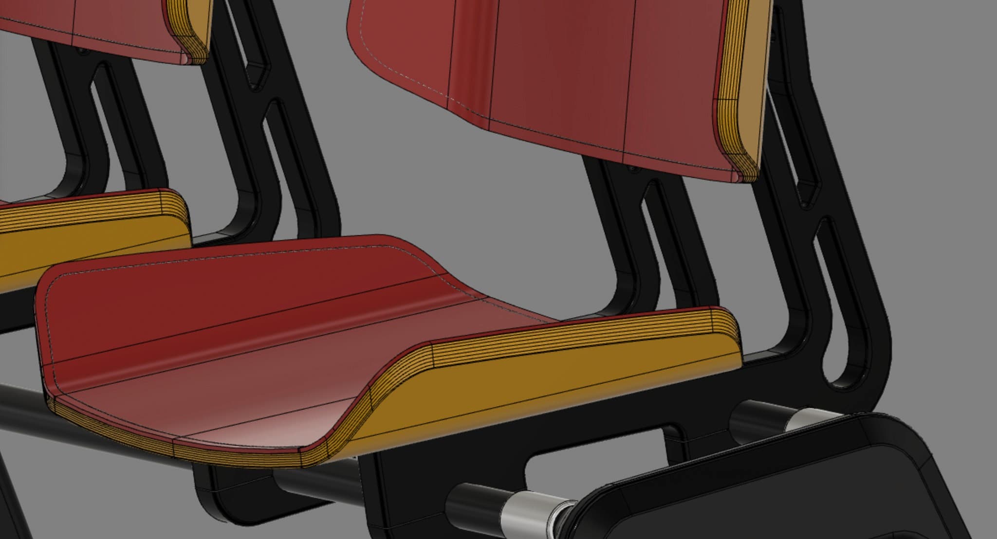 Seat construction — layered plywood with cast metal brackets